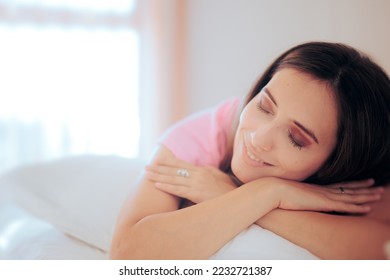 
Happy Woman Relaxing in Bed Smiling and Daydreaming. Calm and serene girl thinking of something positive in the morning
 - Shutterstock ID 2232721387