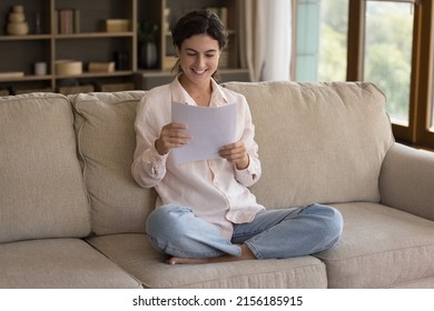 Happy Woman Review Printed Paper Document, Read Written Information Smile Feel Satisfied, Learn Personal Finance Bank Statement Glad About Paid Debt Confirmation Sit On Sofa At Home, Good News Concept