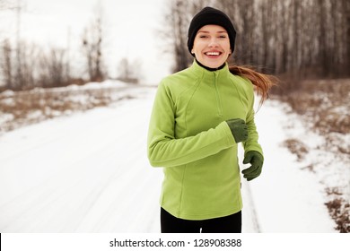 Happy Woman Running In Winter