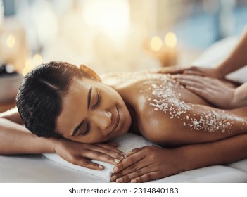 Happy woman, salt scrub and massage back at spa to relax for skincare, exfoliation or self care. Female person, beauty and smile for luxury body treatment, health and wellness with masseuse at salon - Powered by Shutterstock