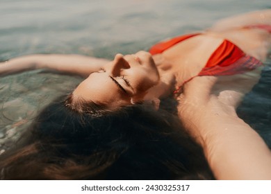 Happy woman sea relaxing floating in transparent sea water on summer holiday. Travel leisure recreation lifestyle, female in nature. - Powered by Shutterstock