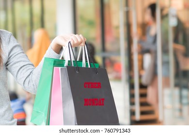 happy woman shopping in cyber monday