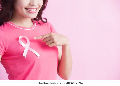 Happy Woman show pink ribbon, great for prevention breast cancer concept - Shutterstock ID 480937126