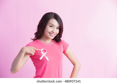 Happy Woman show pink ribbon, great for prevention breast cancer concept - Shutterstock ID 480937141