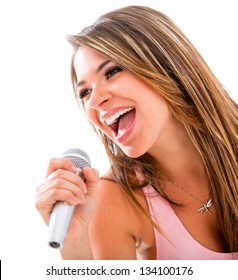 Happy Woman Singing With A Microphone - Isolated Over A White Background