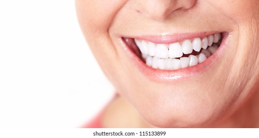 Fröhliche Frau lächelt. Zahnpflege. Weiße Zähne.
