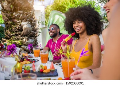 Happy woman smiling at the camera having fun with friends outdoor at the restaurant	
 - Powered by Shutterstock