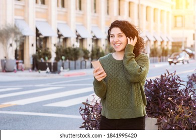 Happy Woman Smiling While She Waits For Her Ride Share Car - Modern Transportation - City