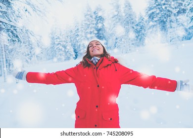 Happy Woman In A Snow Landscape