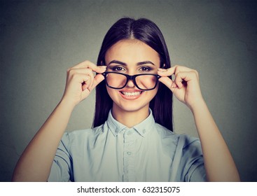 Happy Woman Taking Off Glasses Smiling 