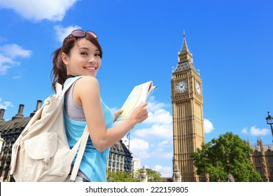 Happy Woman Travel In London With Big Ben Tower, She Look Map And Smile To You, Asian