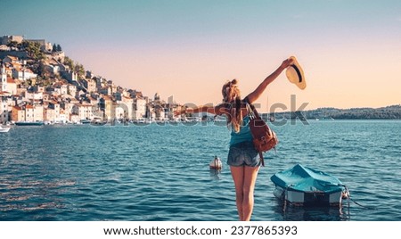 Happy woman traveling in Croatia