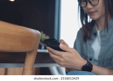 Happy woman using mobile phone at coffee shop, close up, online shopping, mobile banking, e-payment, social media networking, modern people lifestyle concept, smart devices - Powered by Shutterstock