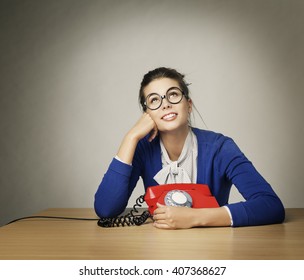  Happy Woman Waiting Phone Call, Thinking Girl Looking Up over Gray Background
