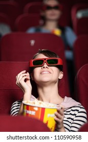 Happy Woman Is Watching 3D Movie