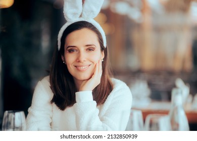 
Happy Woman Wearing Bunny Ears Hosting An Easter Party. Event Planner Enjoying Holiday Themed Party
