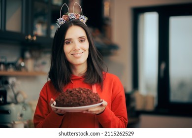 Happy Woman Wearing Easter Bunny Ears With Flowers Holding A Cake. Party Host Celebrating With Homemade Dessert For Spring Holidays