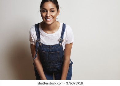 Happy Woman Wears Denim Overalls 