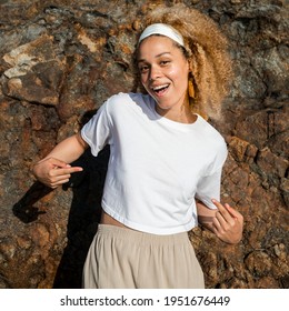 Happy Woman In White Crop Top Outdoor Photoshoot