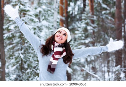 Happy Woman In A Winter Forest