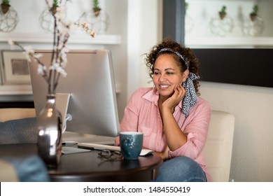 Happy Woman Working From Her Home Office.