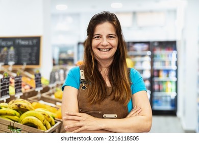 Happy Woman Working Inside Supermarket