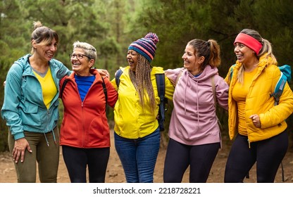 Happy Women With Different Ages And Ethnicities Having Fun In The Woods - Adventure And Travel People Concept