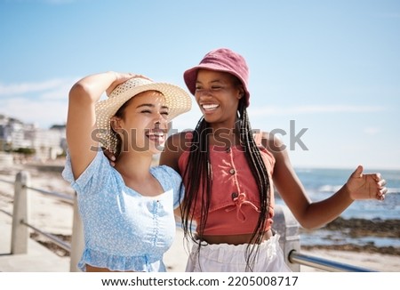 Happy women, friends and summer relax at promenade sea, beach and ocean for fresh air, freedom and fun in Miami Florida. Smile, travel and vacation young people excited for sunshine holiday together
