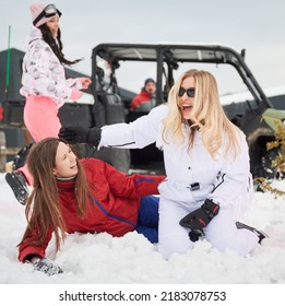 Happy Women Having Fun In Snow. Off-road Buggy Car On Background. Concept Of Active Leisure And Winter Activities.