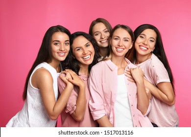 Happy women on pink background. Girl power concept
