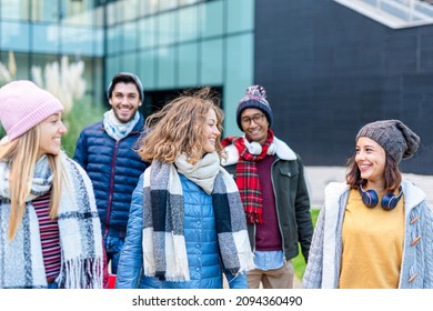 Happy Women Walking With Their Boyfriends On Background, Group Of Millennial Friends Having Fun In The City, Cool Attitude And Trendy Clothes