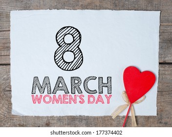 : Happy Women's Day text Calligraphy And Typography Background With heart paper on wooden table - Shutterstock ID 177374402