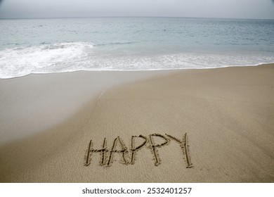 Happy. The Word HAPPY Written in the sand. The word Happy written in the sand with the ocean in the background. Words written in the sand on the beach. Beach Vacation. Its great to be Happy. Vacation - Powered by Shutterstock