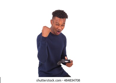 Happy Young African American Man Playing Video Games Celebrating Isolated On White Background - Black People