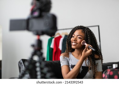 Happy Young African American Woman Streaming A Beauty Vlog From Home, Online Content Creator Applying A Makeup On