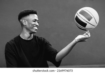 Happy Young African Man Playing Basketball Outdoor - Urban Sport Lifestyle Concept - Black And White Editing