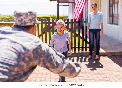 happy young american military family reunion  - Powered by Shutterstock
