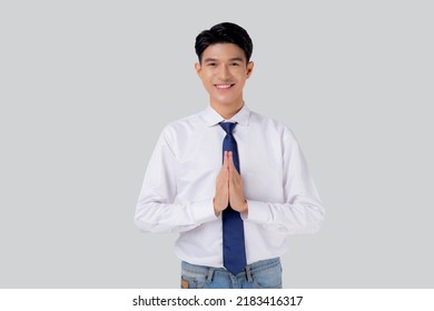 Happy Young Asian Businessman To Pay Respect With Hands Isolated On White Background, Symbol Of Thailand, Happiness Man With Confidence, One Person, Business Concept.