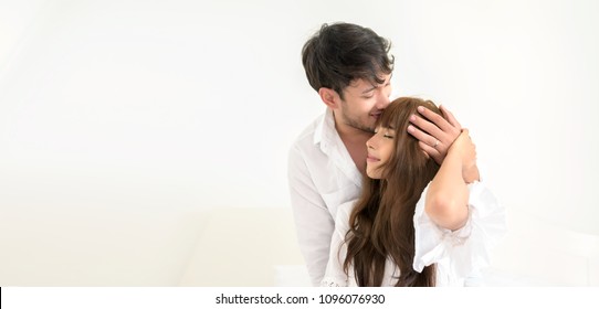 Happy Young Asian Couple Relax At Modern Home . Love Story Couple Concept .