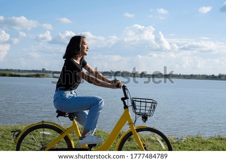 Image, Stock Photo ride a bicycle Elegant