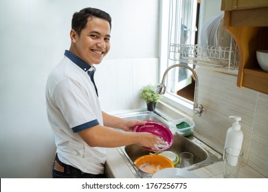 Man Washing Dishes Images Stock Photos Vectors Shutterstock