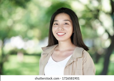 A Happy Young Asian Woman			