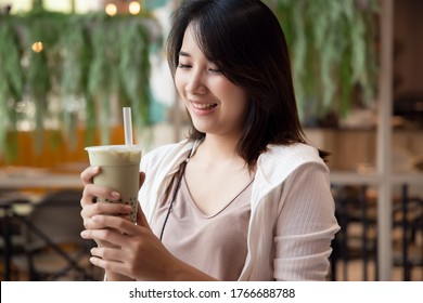 Happy Young Asian Woman Drinking Boba Milk Tea, Bubble Milk Tea, Pearl Milk Tea