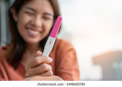 Happy Young Asian Woman Holding Pregnancy Stock Photo 1498650785