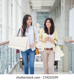 Happy Young Asian Women Shopping.