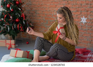 happy young beautiful girl talking on the phone or taking a selfie with her gift. Curvy Model Images, Stock Photos & Vectors | Shutterstock