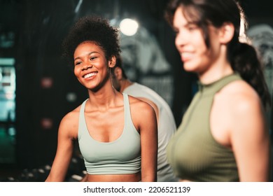 Happy Young Black Athlete Woman Working Out At The Gym With A Pal In Athletic Clothing. Lifestyle Activity For Ladies To Get Strong And Skinny.