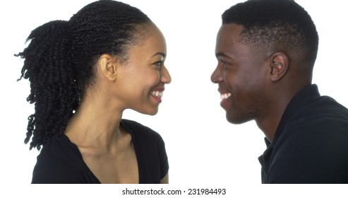 Happy Young Black Couple Looking At Each Other Smiling