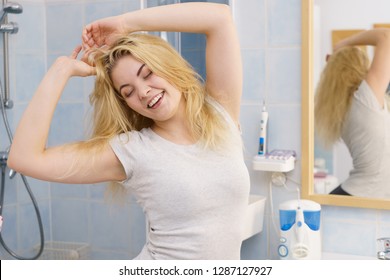 Happy Young Blonde Woman After Waking Up In Bathroom. Female Feeling Great Fresh And Clean.