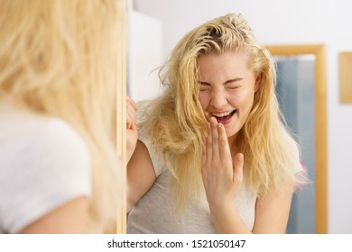 Happy Young Blonde Woman After Waking Up In Bathroom. Female Feeling Great Fresh And Clean.